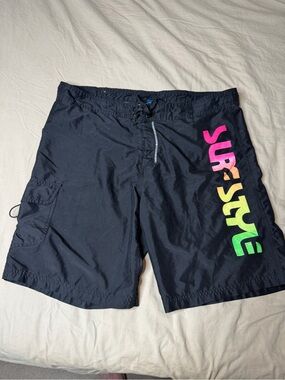 surf style Black Swim Board Shorts with Neon Gradient Logo